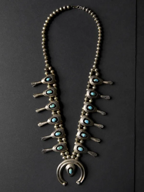 vintage turquoise squash blossom sold by Imogene + Willie