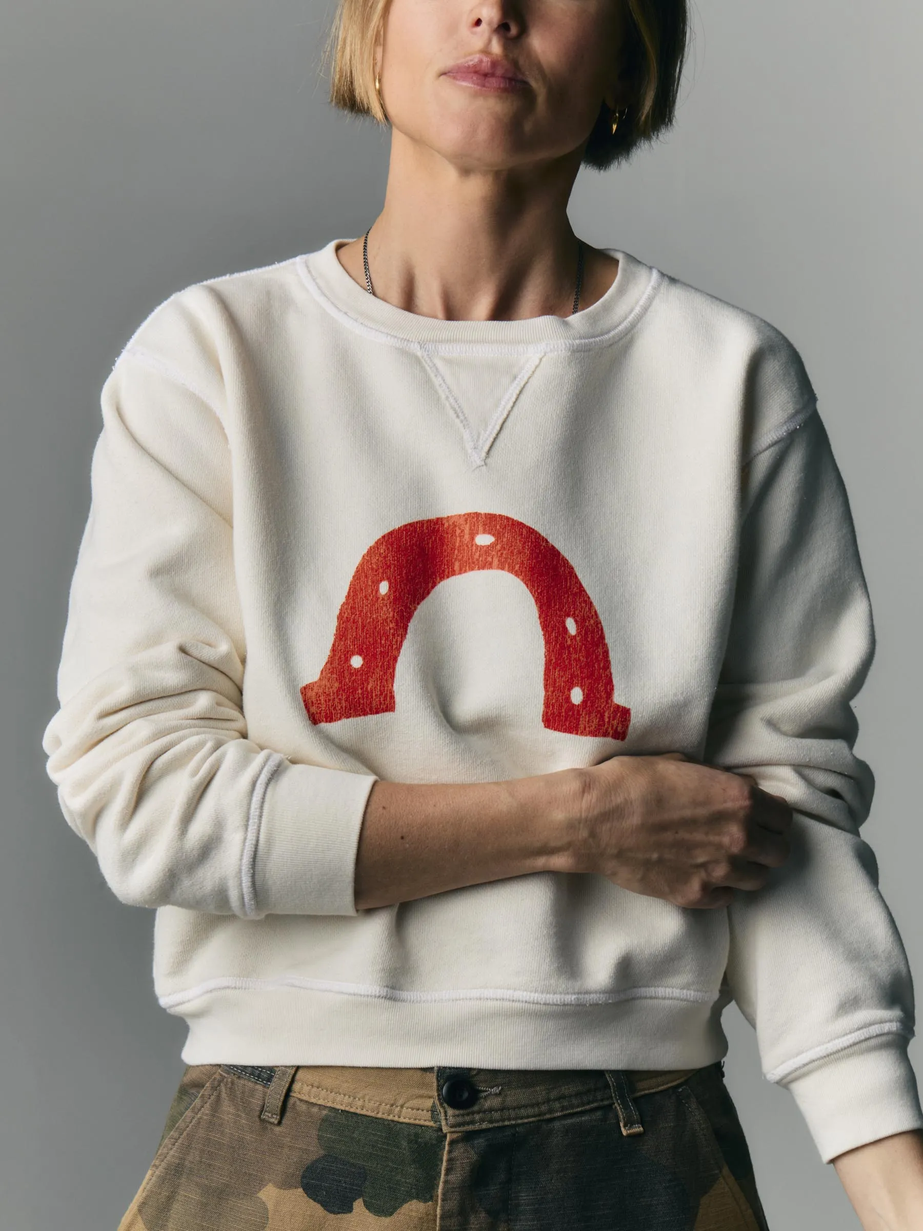 the "horseshoe" penny sweatshirt sold by Imogene + Willie