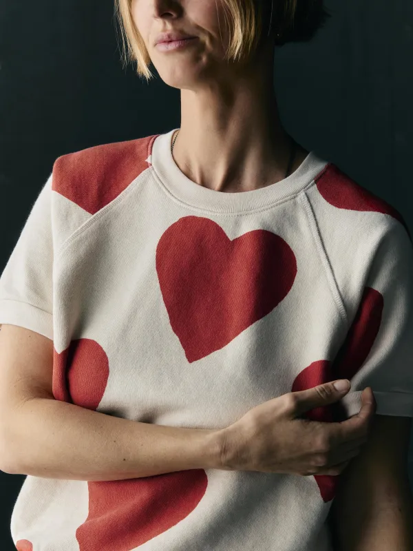 s/s "hearts all over" raglan sweatshirt sold by Imogene + Willie