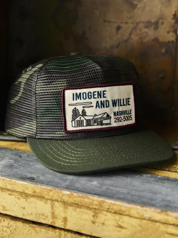 the "service station" mesh trucker in camo sold by Imogene + Willie