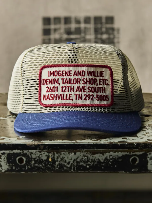 the "tailor shop" mesh trucker sold by Imogene + Willie