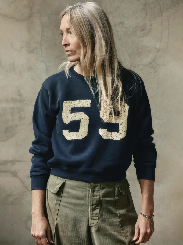 the "59" penny sweatshirt sold by Imogene + Willie