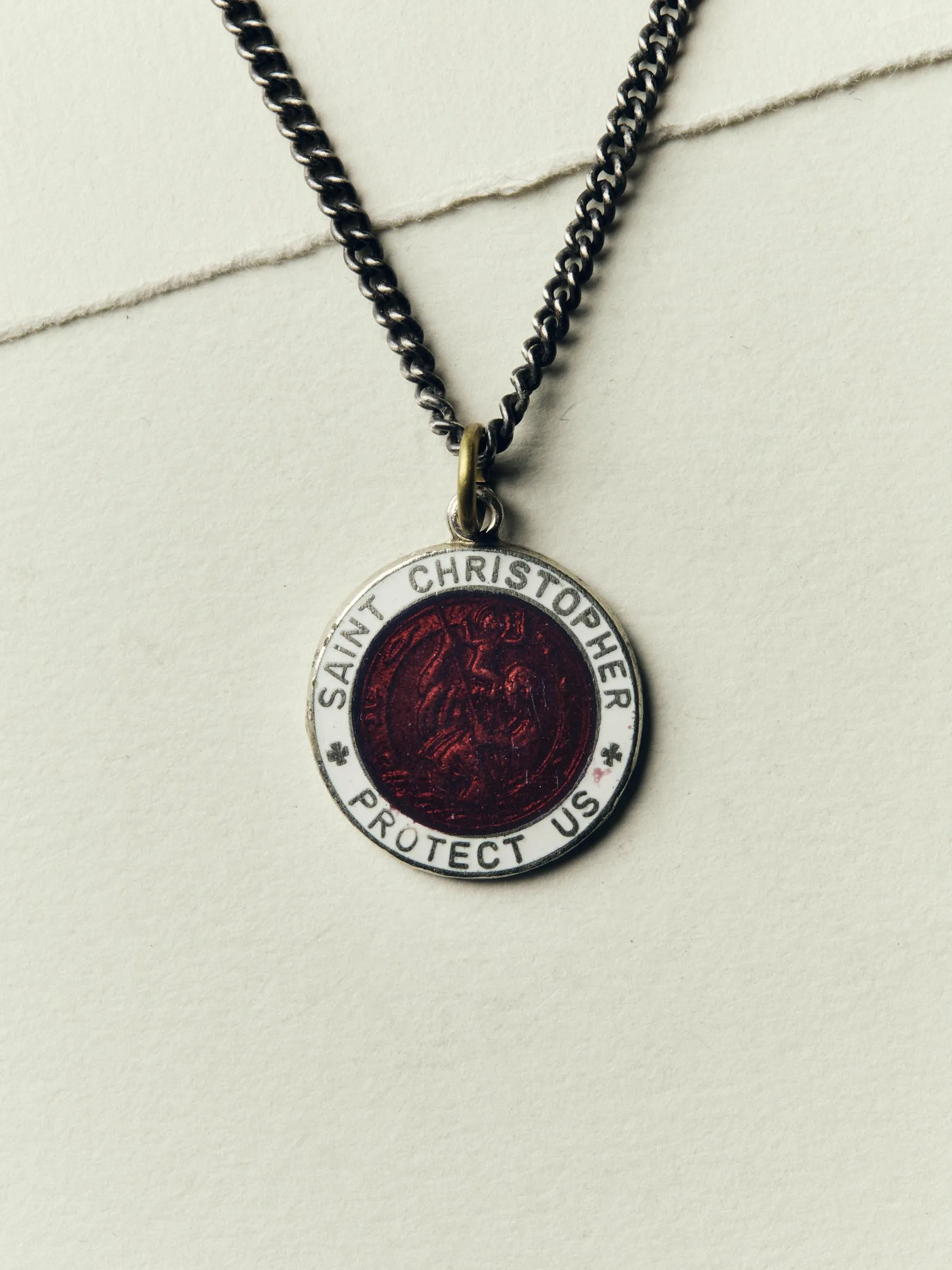 vintage "st. christopher" medal pendant sold by Imogene + Willie