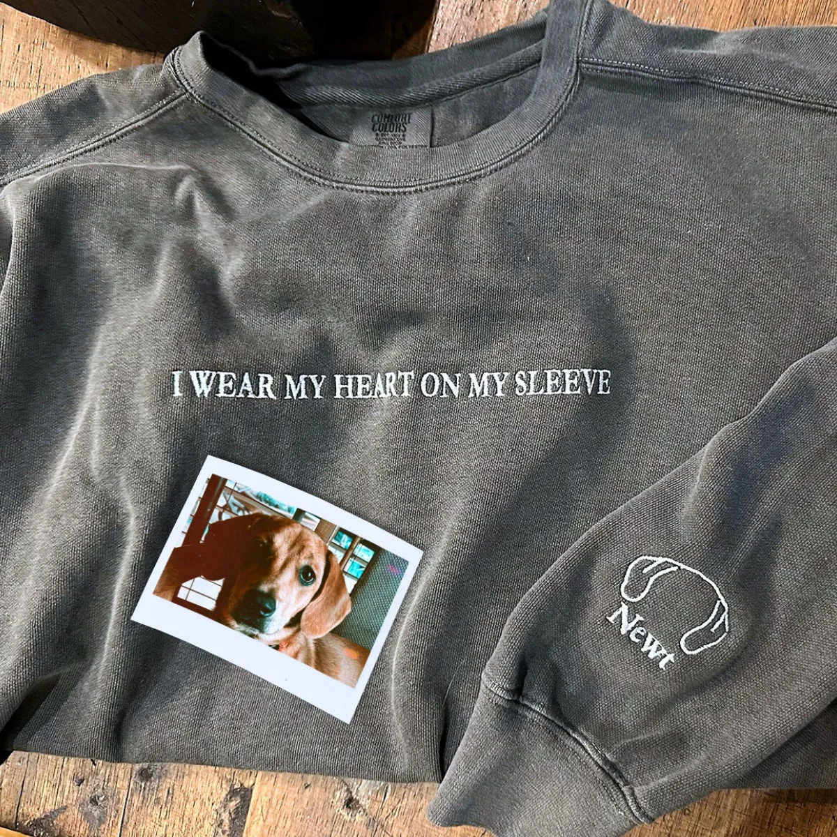 Comfort Color® In My Dog Mom Era Sweatshirt with Custom Embroidered Dog Ear on Sleeve sold by Embroly