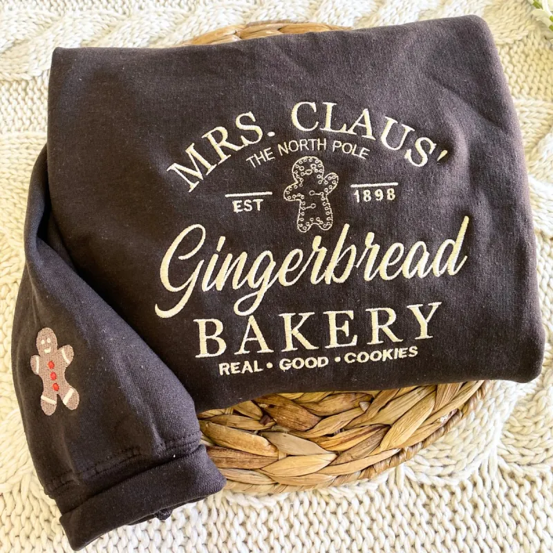 Mrs Claus Gingerbread Bakery Embroidered Sweatshirt for Christmas sold by Embroly