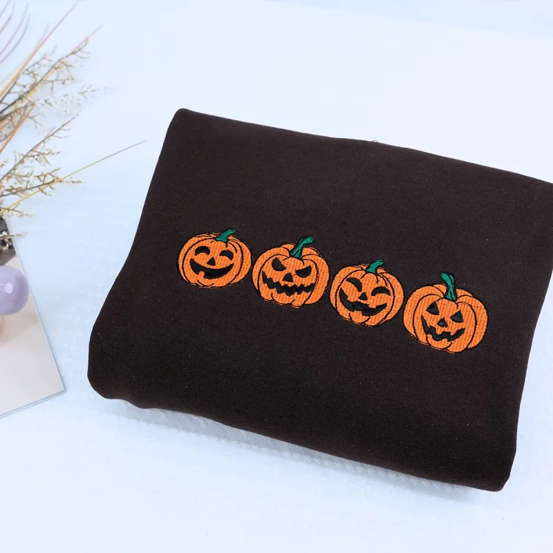 Pumpkin Sweatshirt, Fall Spooky Season Crewneck Embroidered for Halloween sold by Embroly