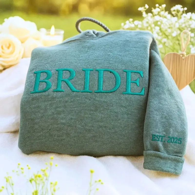 Personalized Unique Bridal Shower Gift for Granddaughter with Bride Sweatshirt Embroidered, Text Heart on Sleeve sold by Embroly