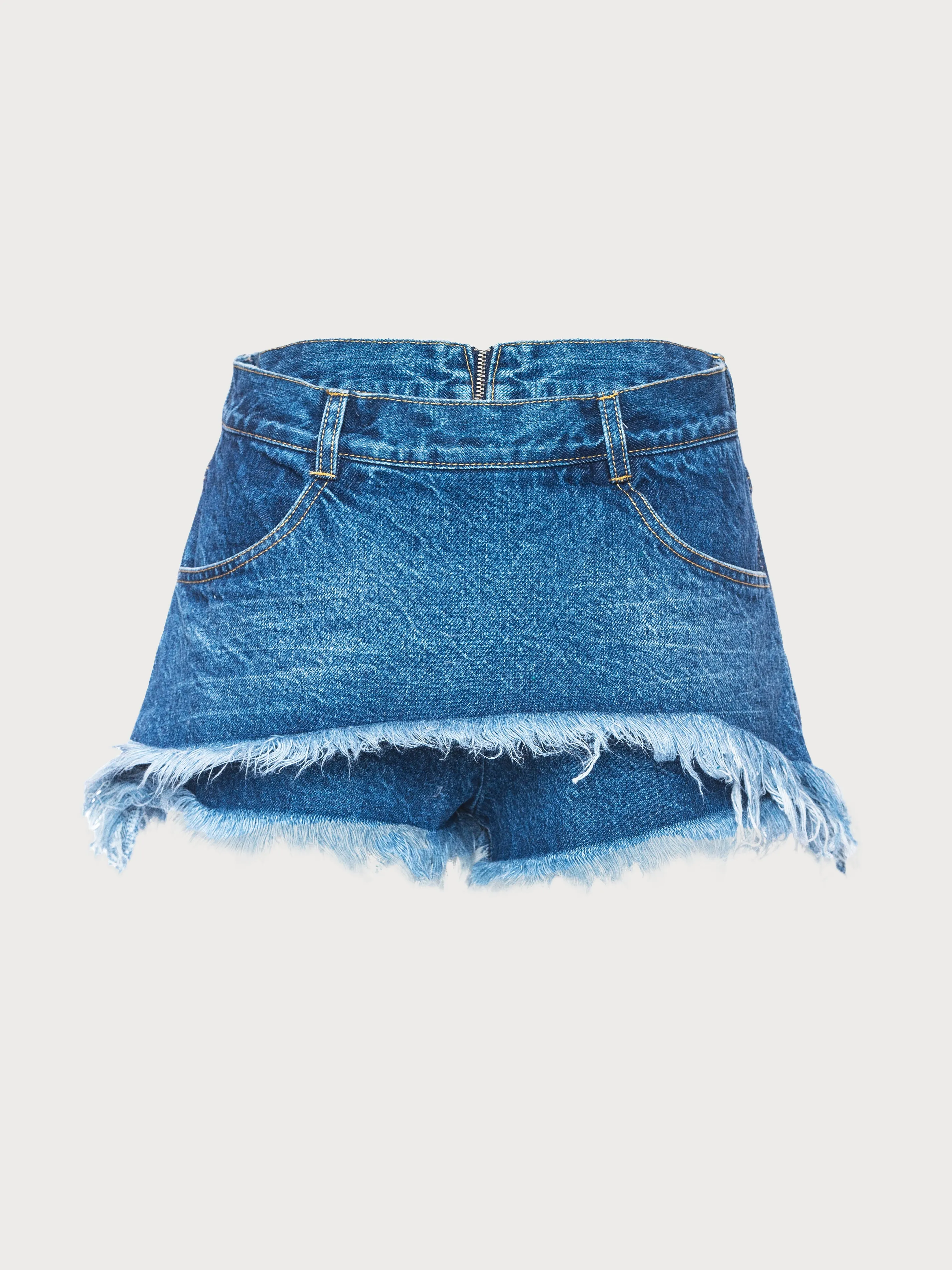 Denim Fringed Skort sold by KSENIASCHNAIDER
