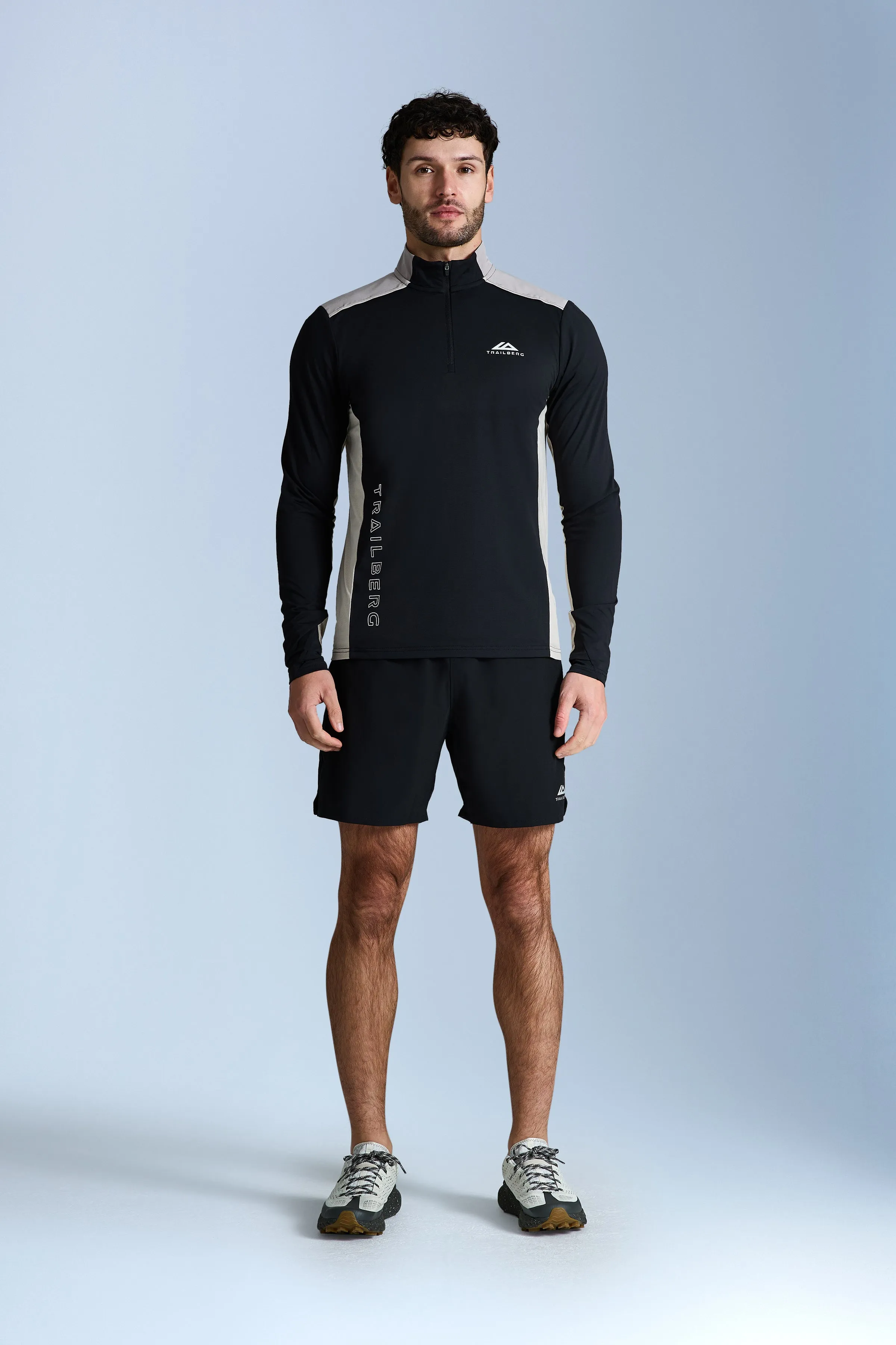 AW25 Triathlon Essentials Quarter Zip Set - Black/Pale Taupe sold by Trailberg
