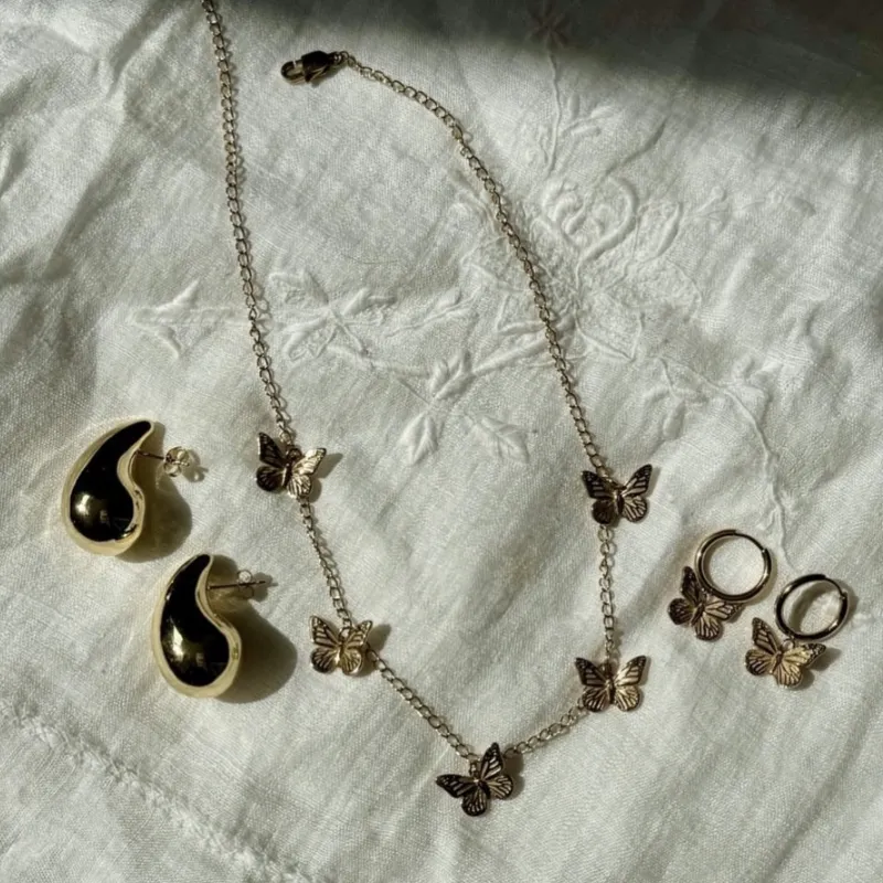 Mariposa Charms sold by Sunday Club