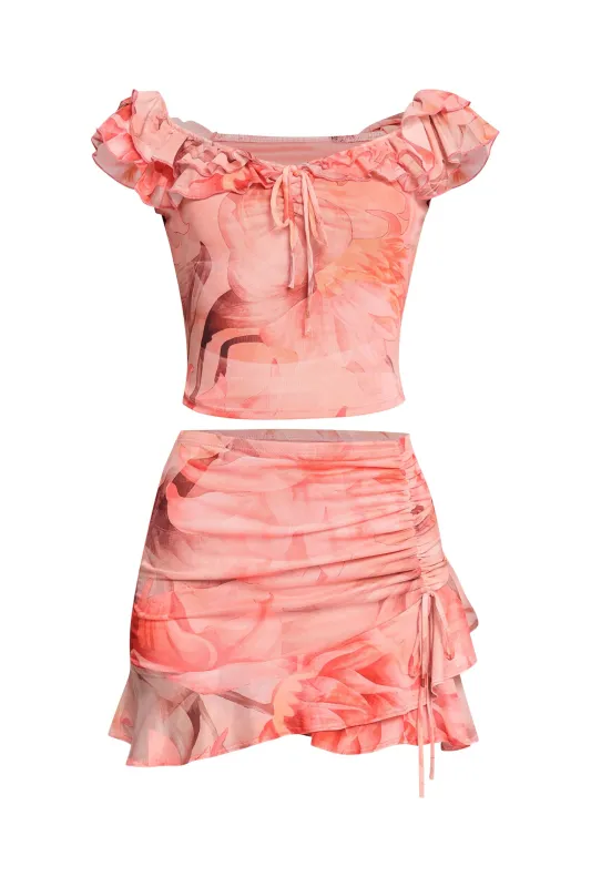 Mesh ruffled off shoulder top and mini skirt set sold by Bogomore