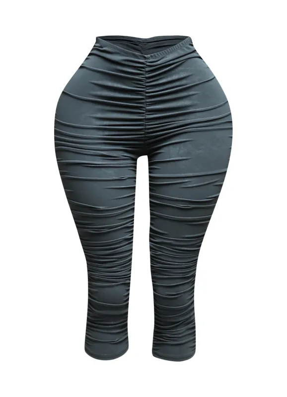 All over ruched denim pu capri sold by Bogomore