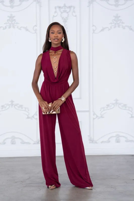 Mock neck cowl front wide leg jumpsuit sold by Bogomore