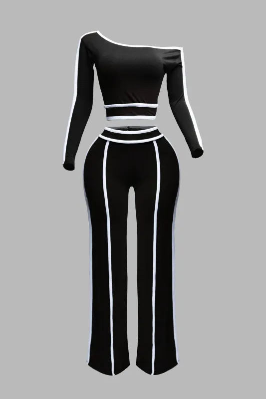 Color contrast detailed off shoulder long sleeve top with wide leg pants sold by Bogomore