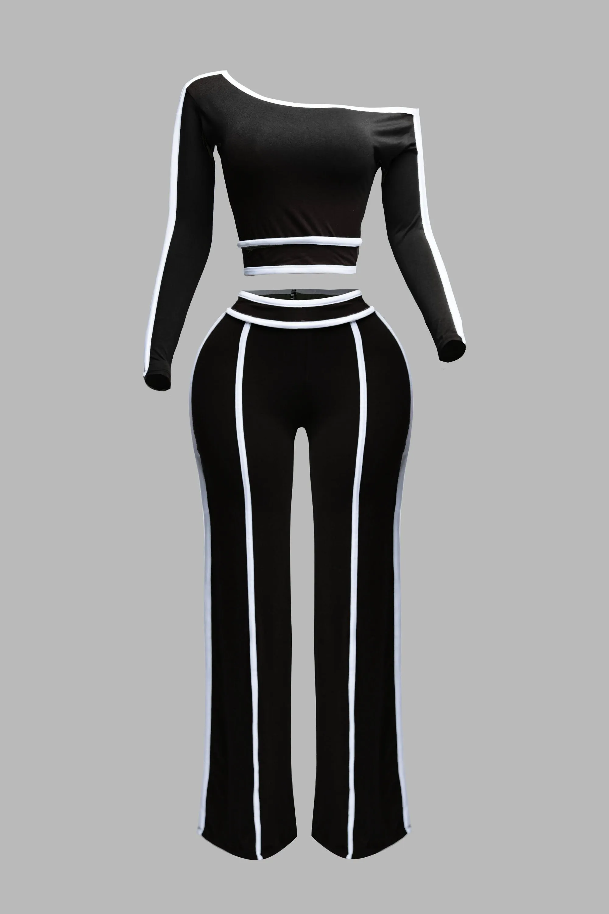 Color contrast detailed off shoulder long sleeve top with wide leg pants sold by Bogomore