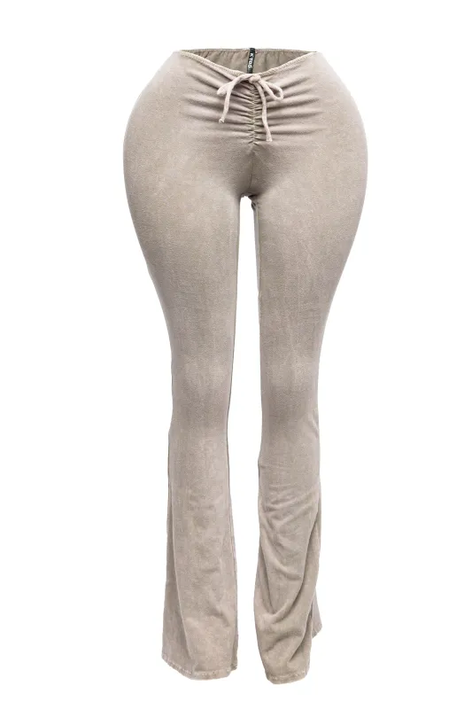 Mineral washed ruched rise flare pant sold by Bogomore