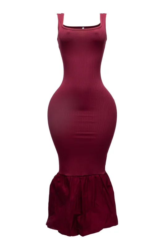 Sleeveless mermaid bubble hem dress sold by Bogomore