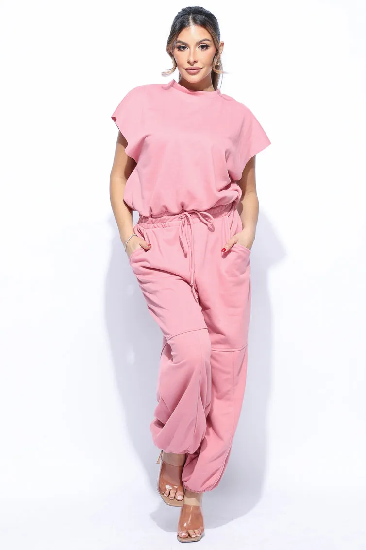 Open back jogger jumpsuit sold by Bogomore