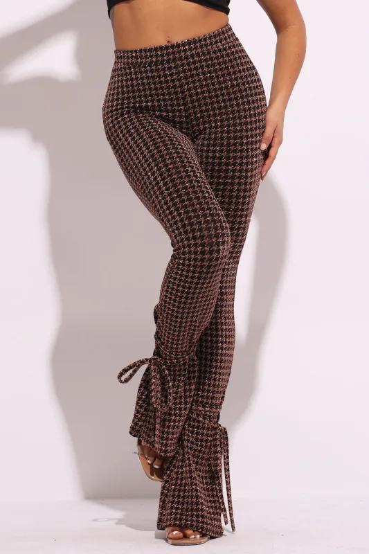 Houndstooth print split hem pants sold by Bogomore