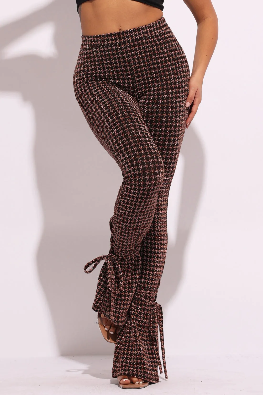 Houndstooth print split hem pants sold by Bogomore