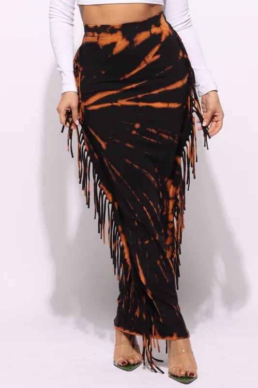 Tie dye fringed maxi skirt sold by Bogomore