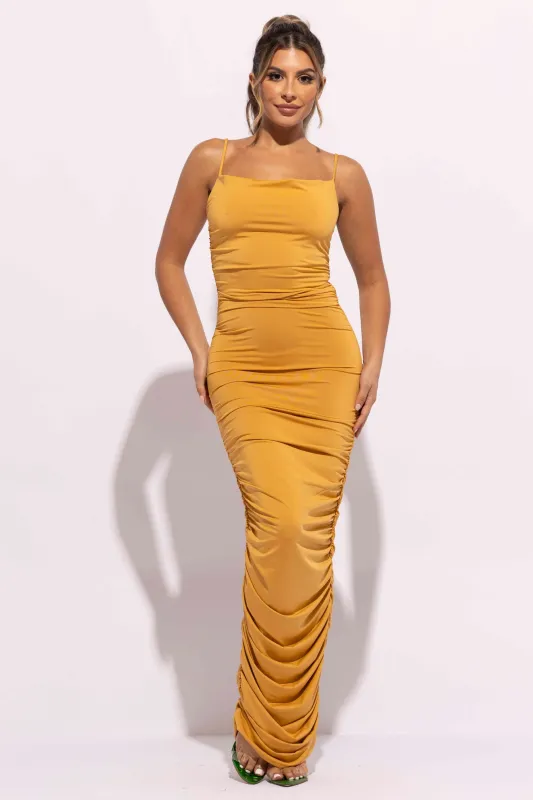 Cowl neck all over ruched maxi dress sold by Bogomore