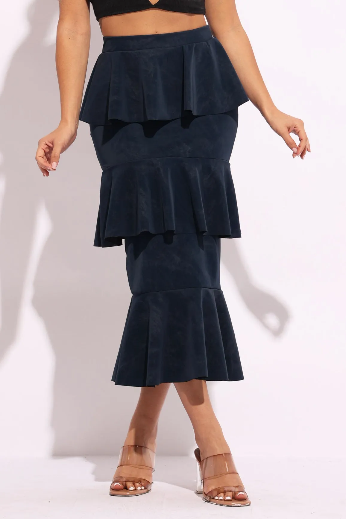 Layered ruffle midi skirt sold by Bogomore