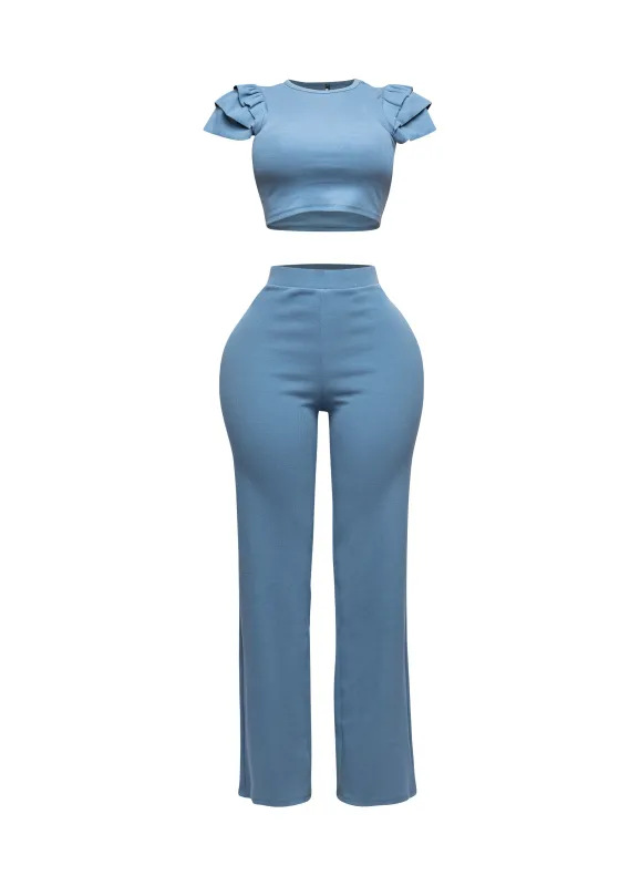 Ruffled shoulder top and pants set sold by Bogomore