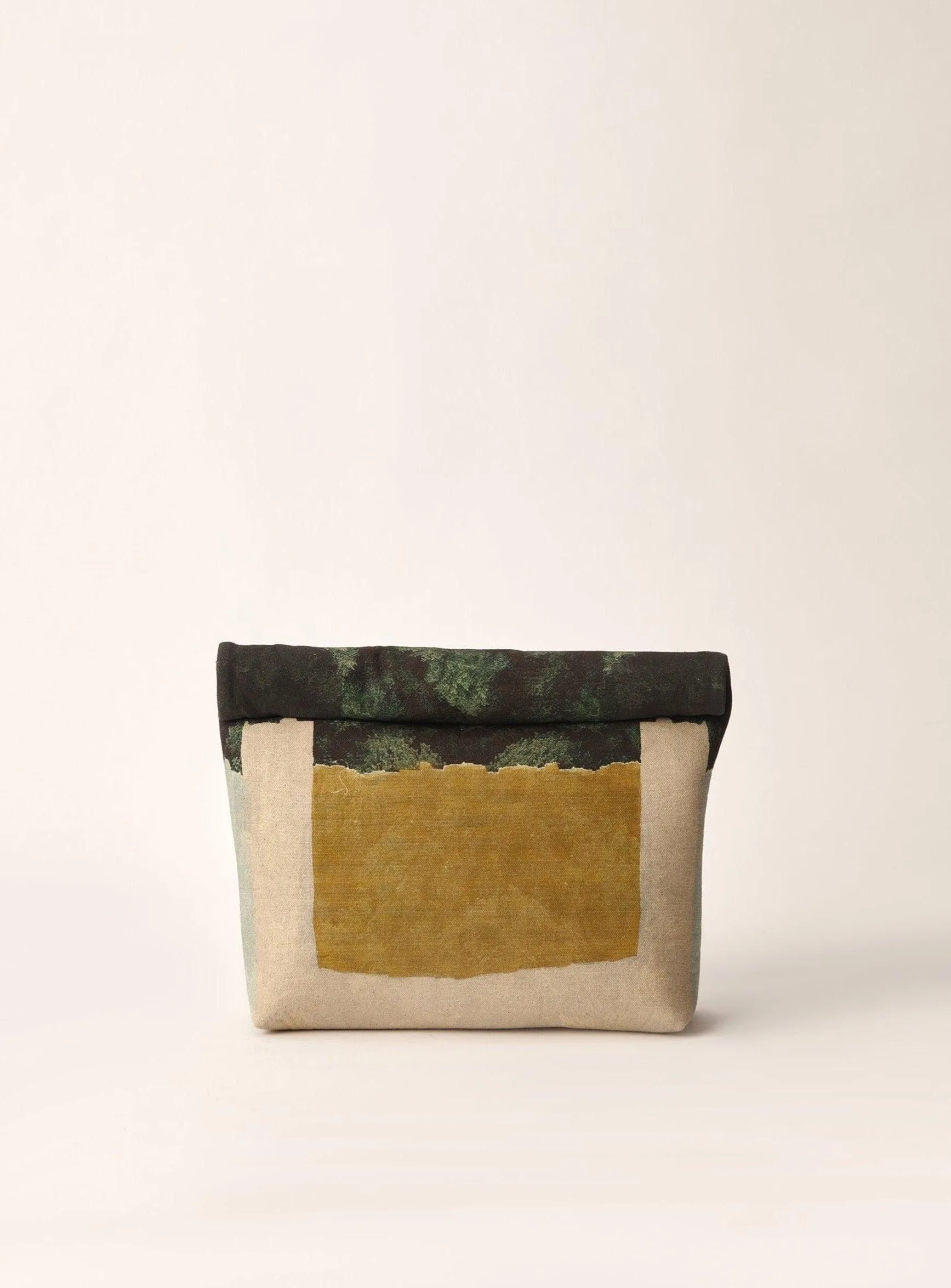 Roll Up Clutch sold by Cord