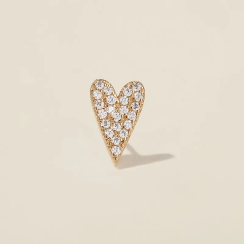 Crème crystal heart piercing sold by Adornmonde