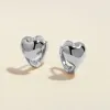 Boo heart mini huggie earrings sold by Adornmonde