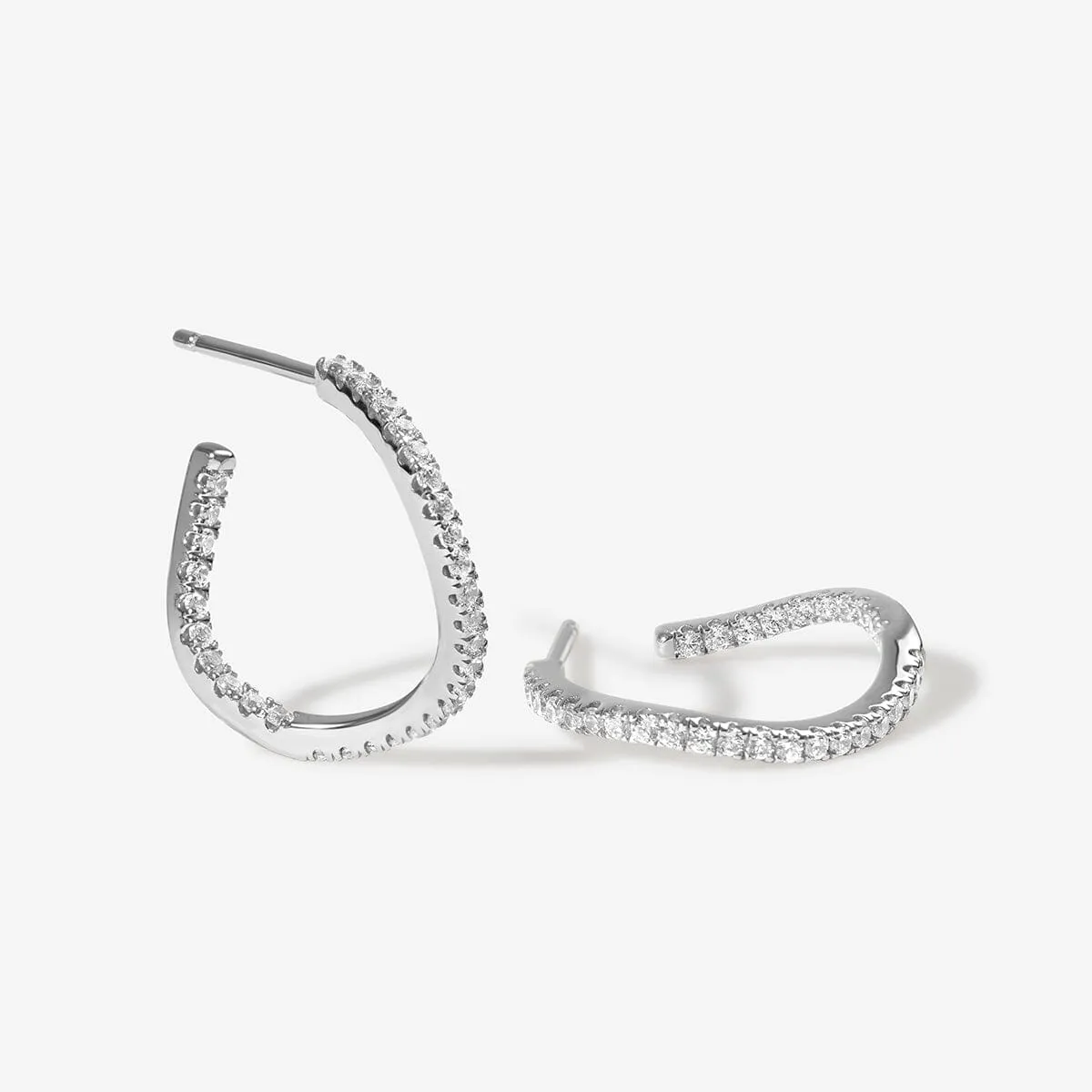 Kaelin wave mini hoop earrings sold by Adornmonde