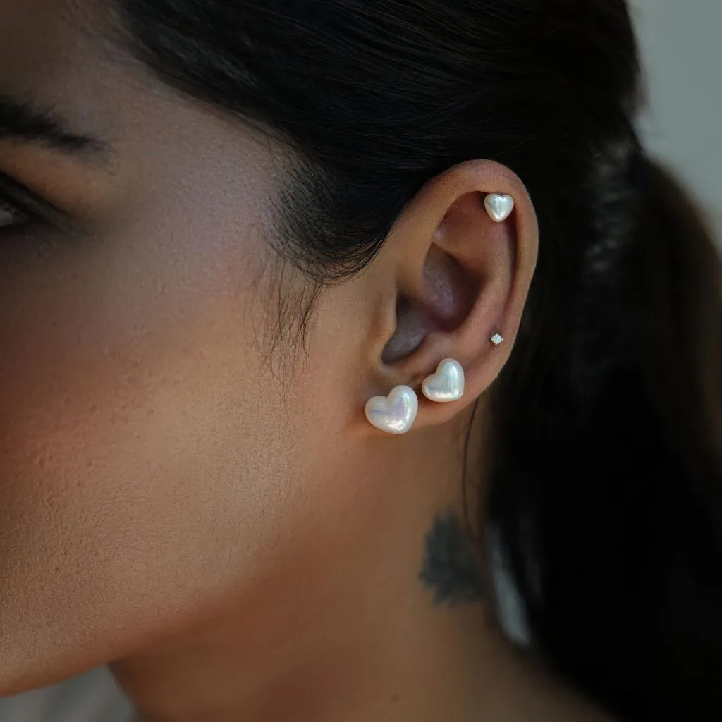 Puffy pearl hearts 3-piece piercing set sold by Adornmonde product image thumbnail 5