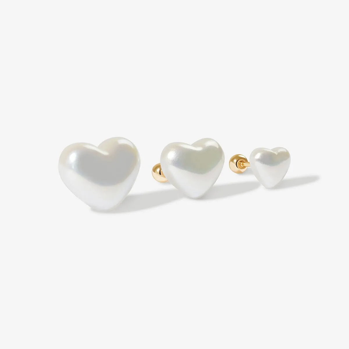Puffy pearl hearts 3-piece piercing set sold by Adornmonde product image thumbnail 3