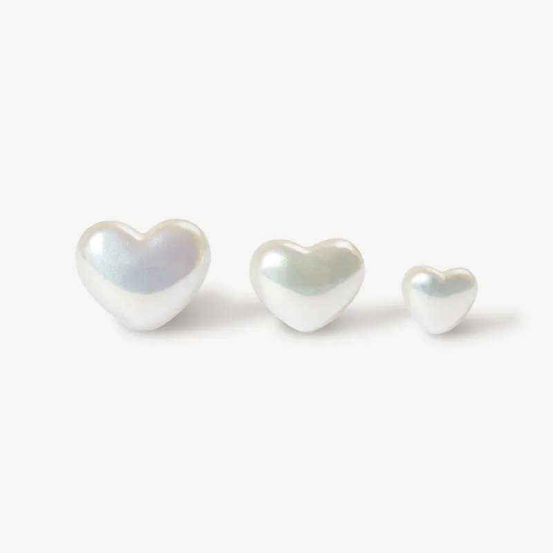 Puffy pearl hearts 3-piece piercing set sold by Adornmonde