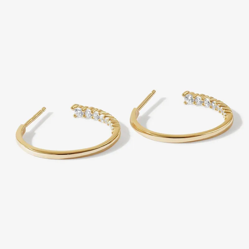 Bentley midi hoop earrings sold by Adornmonde
