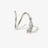 Lester twist earrings sold by Adornmonde