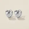 Bae heart midi huggie earrings white gold sold by Adornmonde