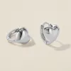 Bae heart midi huggie earrings white gold sold by Adornmonde