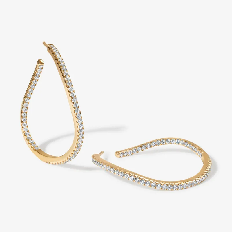 Tao wave maxi hoop earrings sold by Adornmonde
