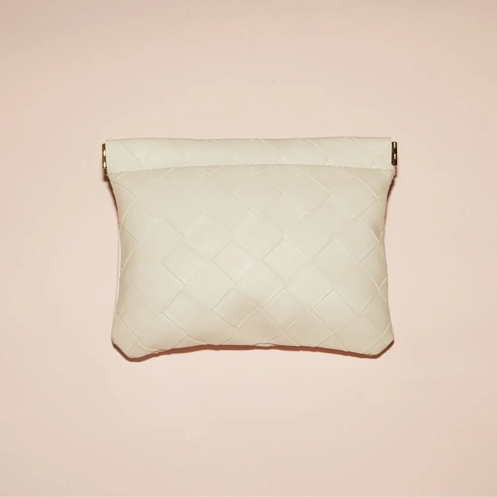 Large woven clutch sold by Adornmonde