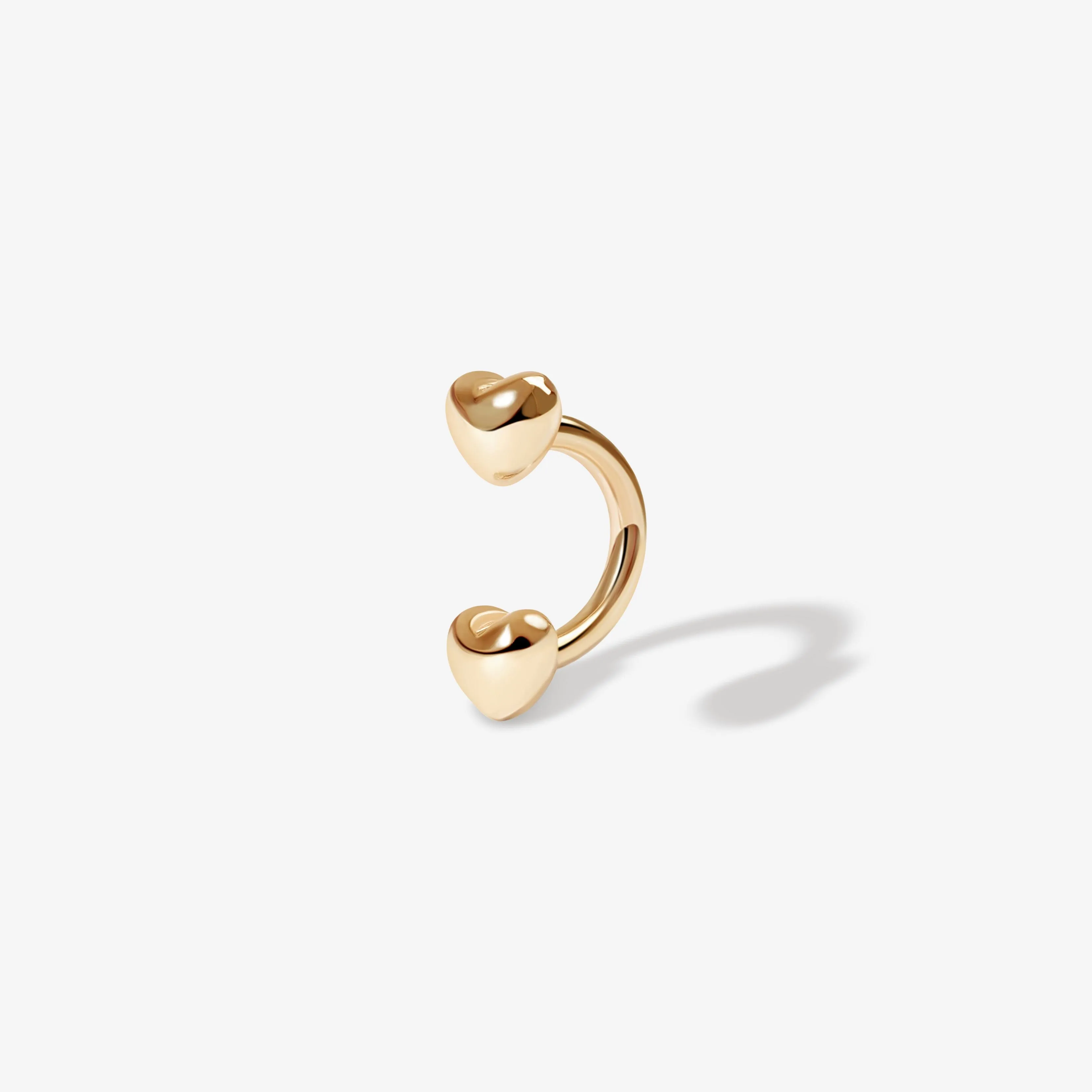 Fabio heart u hoop piercing sold by Adornmonde