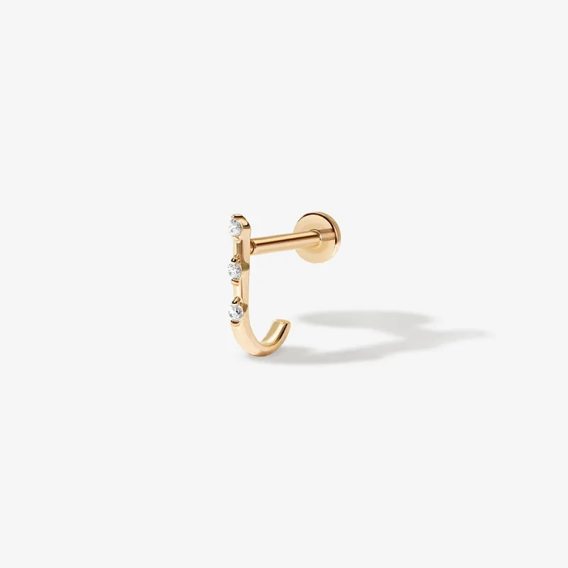 Lane diamond J piercing sold by Adornmonde