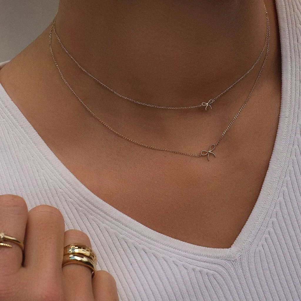 Atticus micro bow necklace sold by Adornmonde product image thumbnail 2