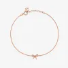 Asher micro bow bracelet sold by Adornmonde