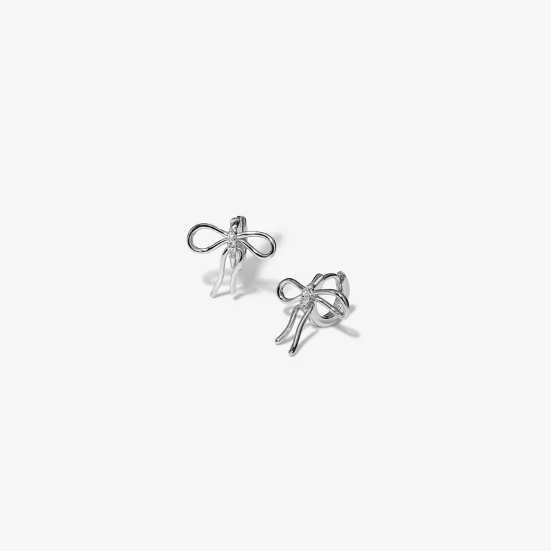 Cliff bow huggie earrings sold by Adornmonde
