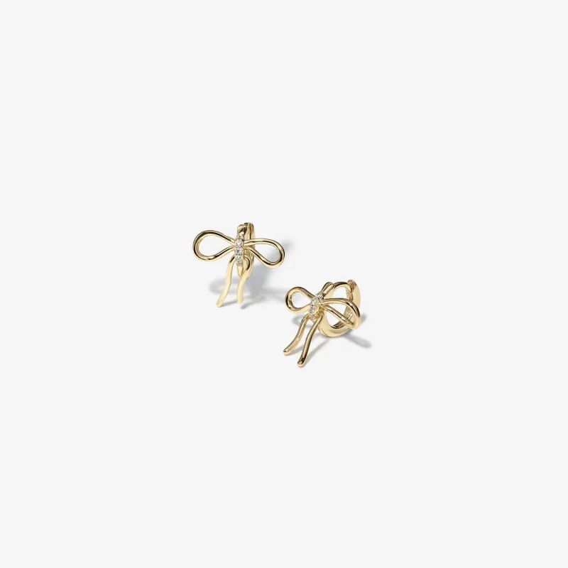 Cliff bow huggie earrings sold by Adornmonde