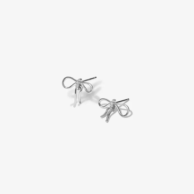 Lars bow stud earrings sold by Adornmonde