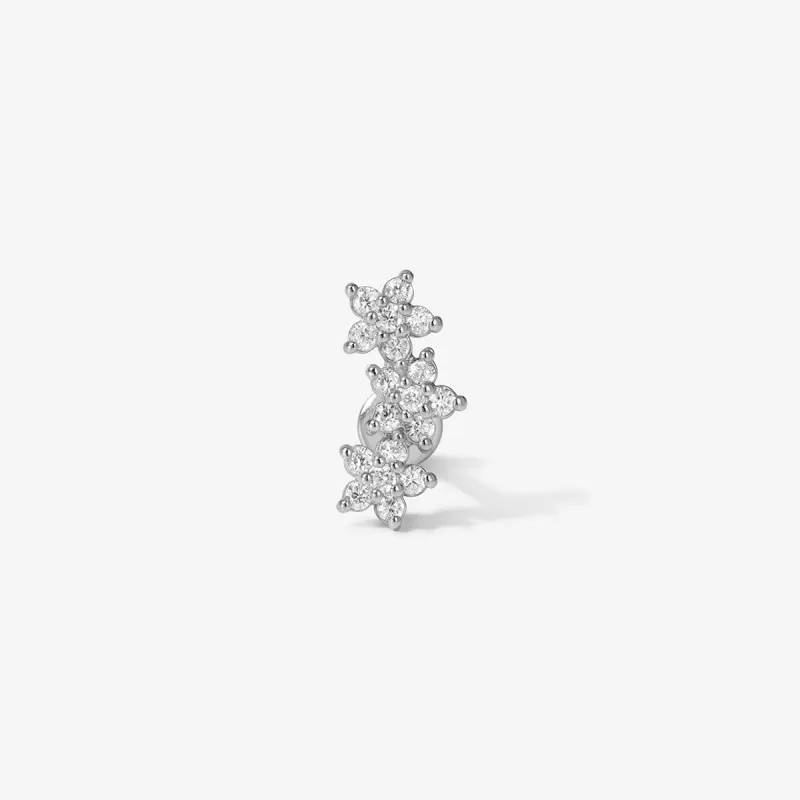 Jarrett triple micro flower piercing sold by Adornmonde