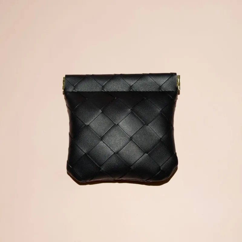 Small black woven pouch sold by Adornmonde